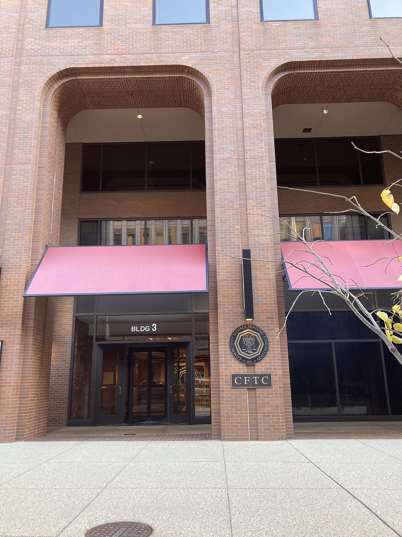 The CFTC building with the Commodity Futures Trading Commission logo and text visible.