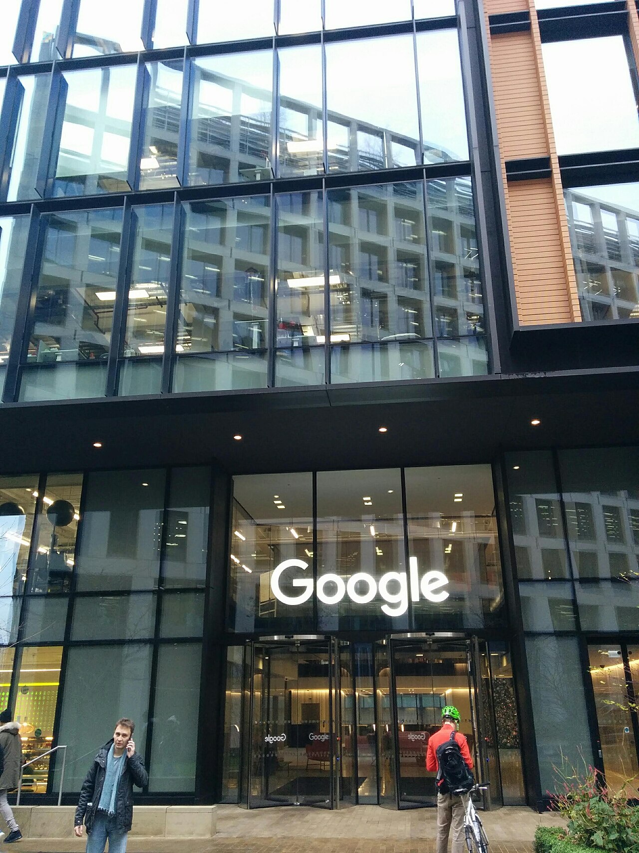 A Google building with people outside