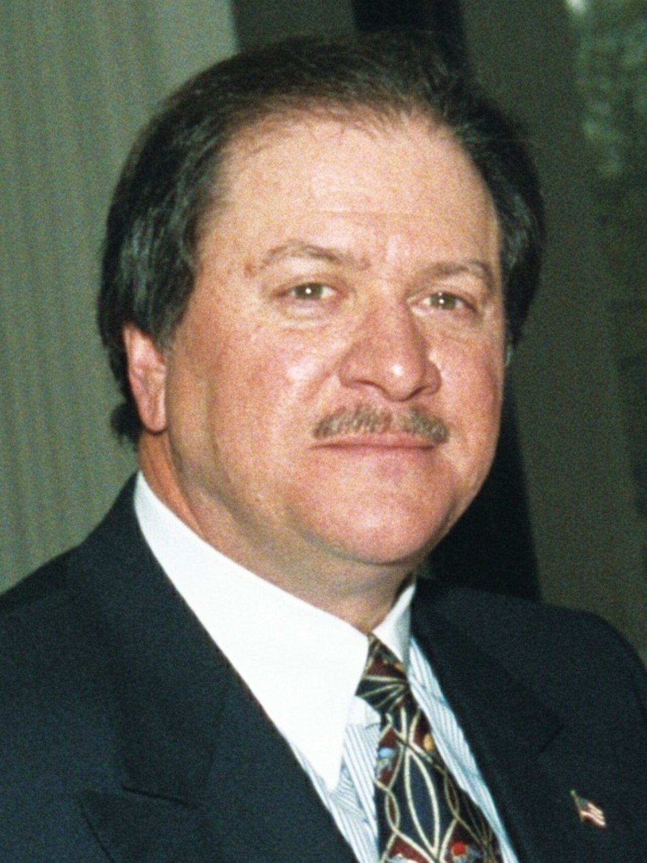 Joseph diGenova in a suit and tie, 2002 portrait
