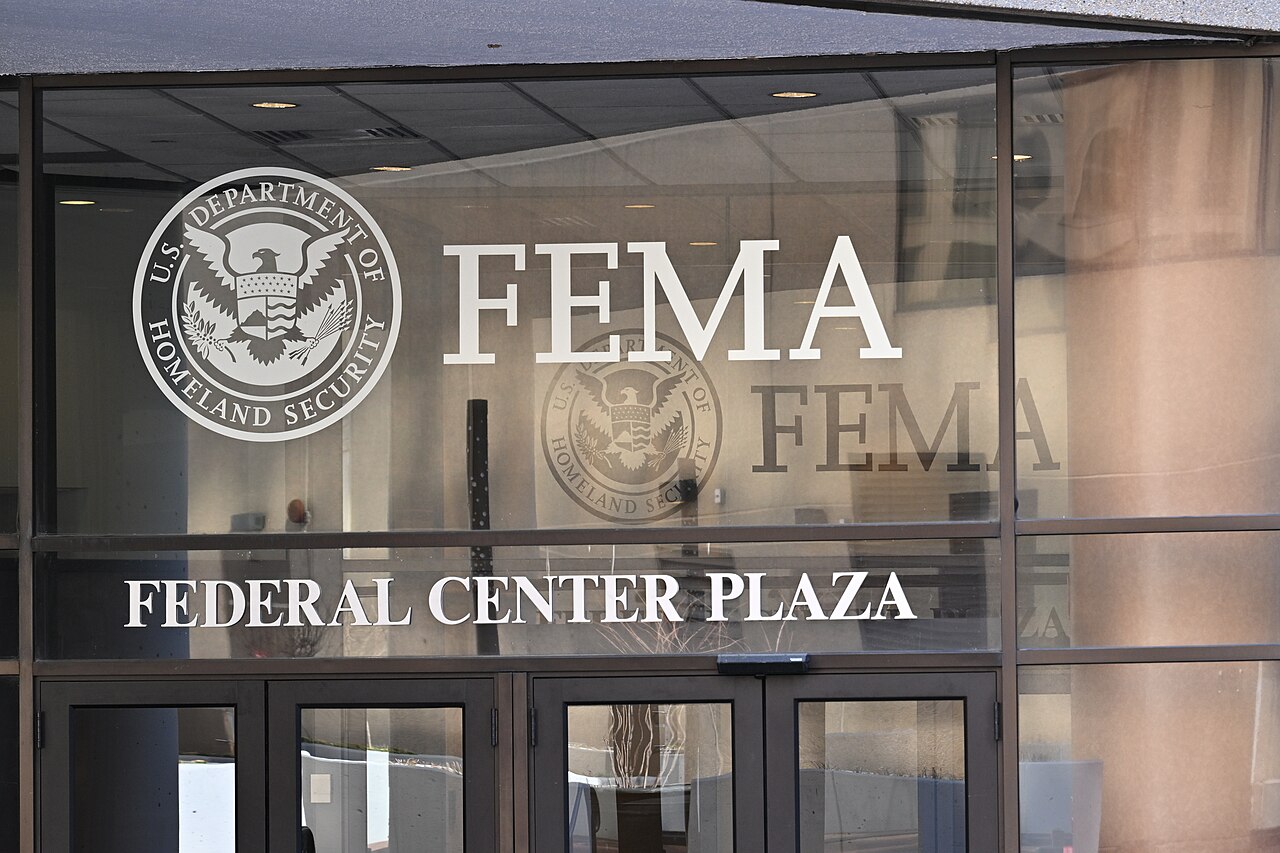 FEMA logo and seal on glass door of Federal Center Plaza building