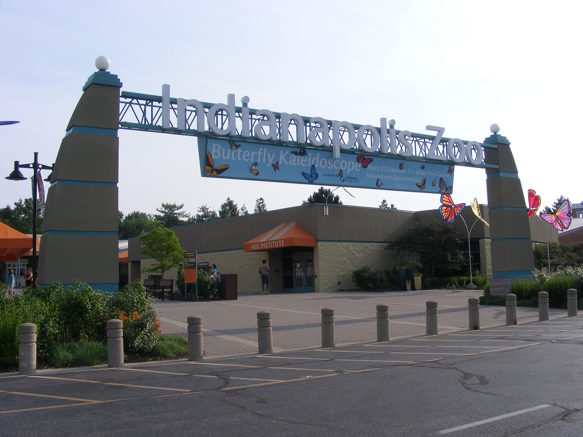 The entrance to the Indianapolis Zoo featuring a Butterfly Kareidoscope exhibit sign