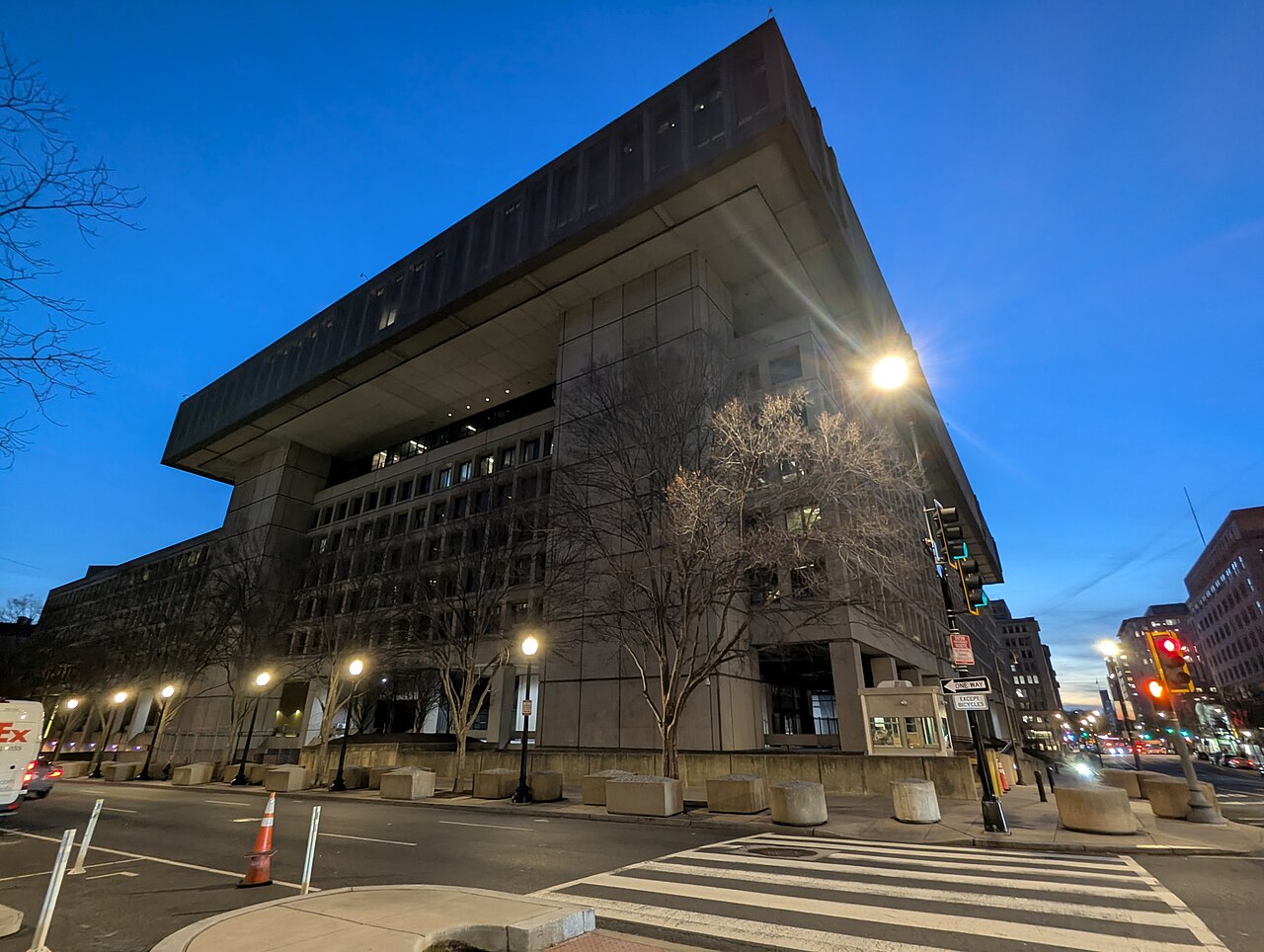 The J. Edgar Hoover Building, headquarters of the FBI, at dusk.