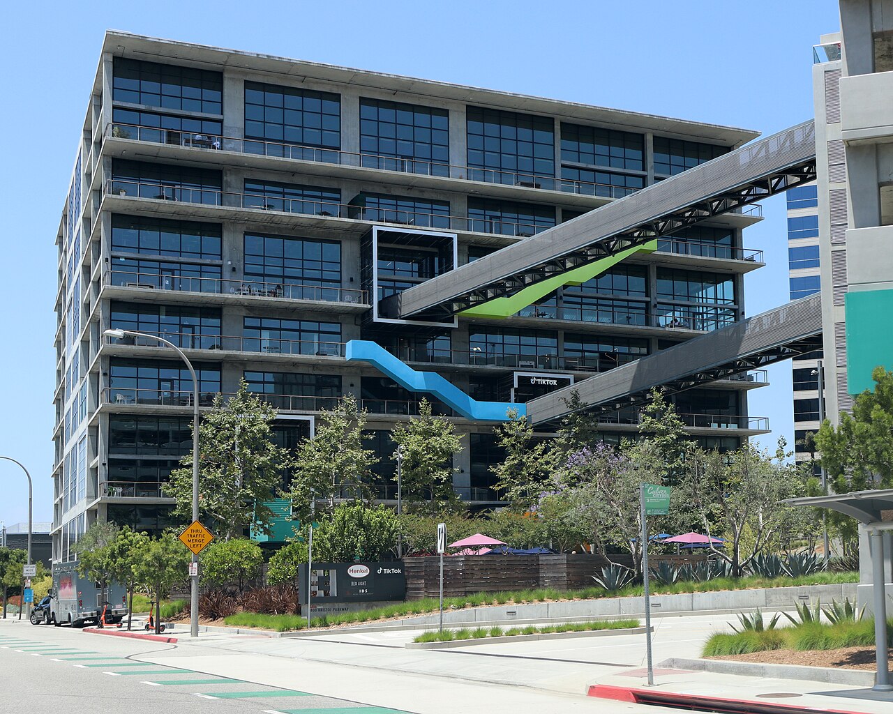 Modern glass office building with a TikTok logo on it, the company's headquarters in Culver City, California
