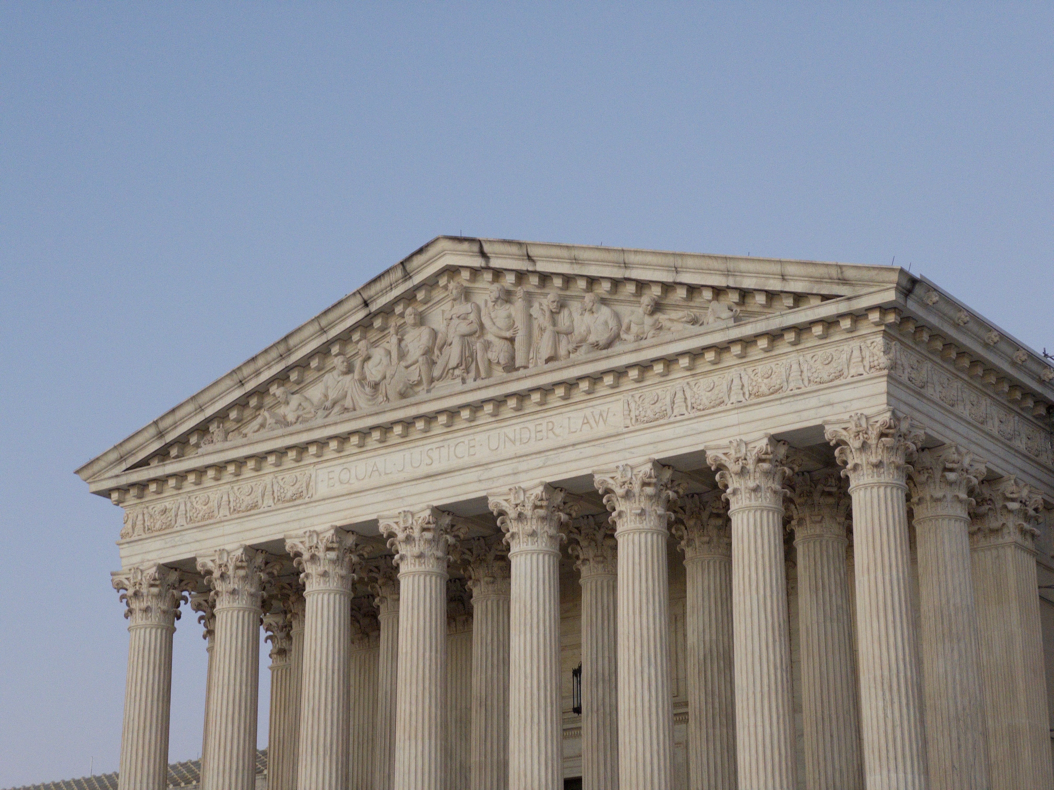 The west front of the United States Supreme Court building in Washington, columns and pediment, photographed in 2024.