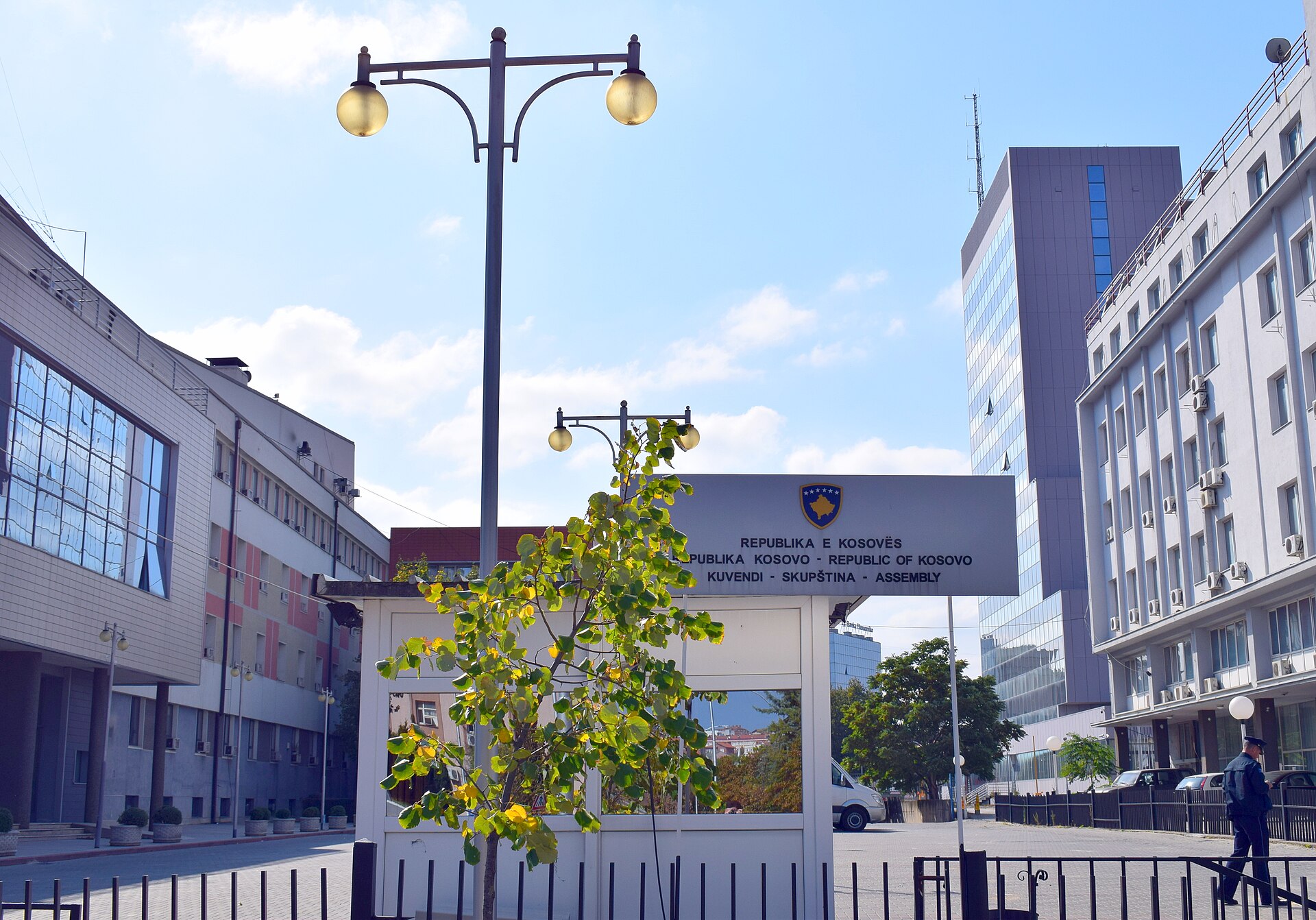 A sign that reads Republika e Kosoves Publiaka Kosovo - Republic of Kosovo Kuvendi - Skupstina - Assembly