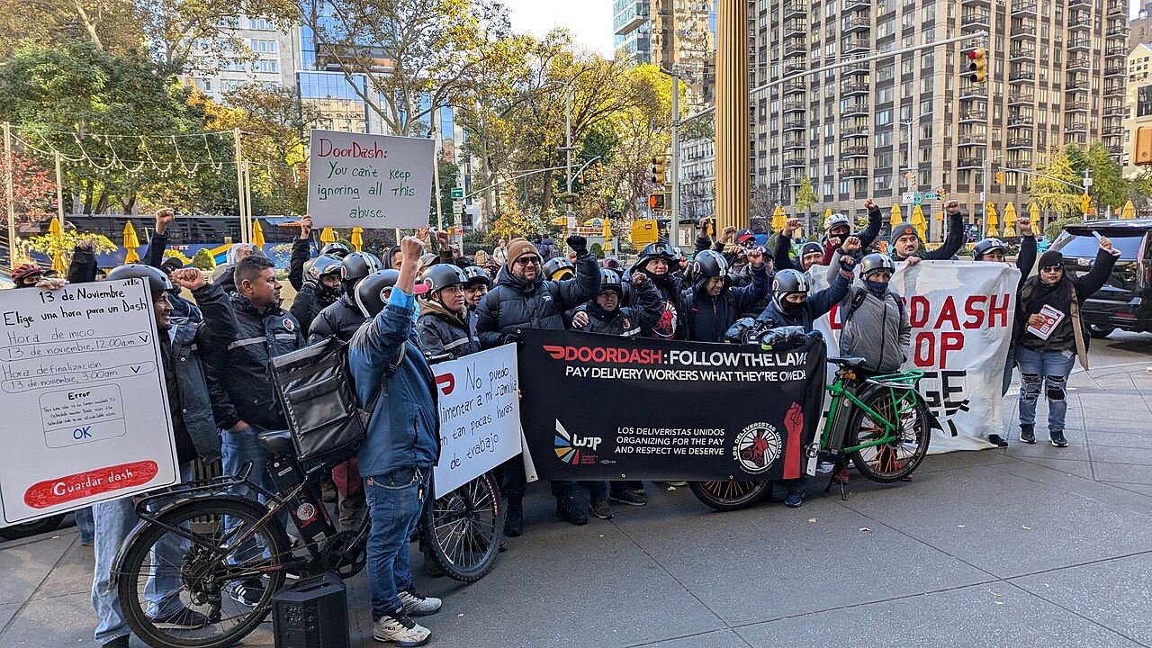 New York delivery workers protest wage theft at DoorDash in Manhattan in 2024.