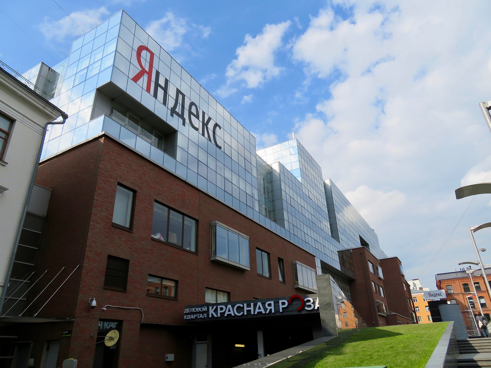 A building with a red Yandex sign on top