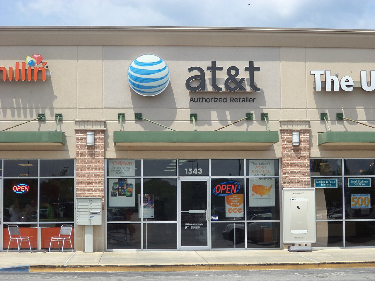 AT&T storefront with Authorized Retailer sign and blue and white logo