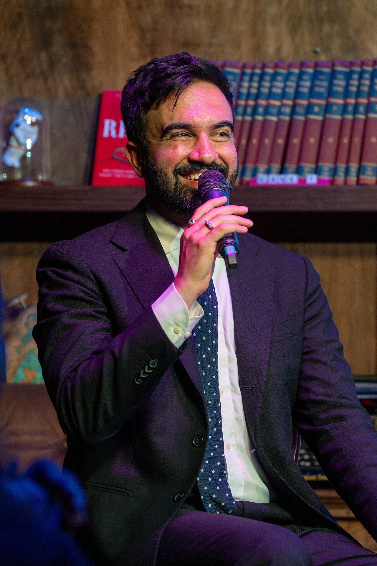 Zohran Mamdani photographed at Caveat in May 2025