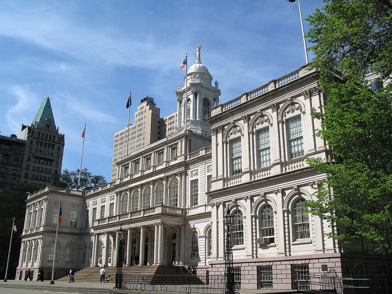 York City Council building with a large white facade, columns, and a dome